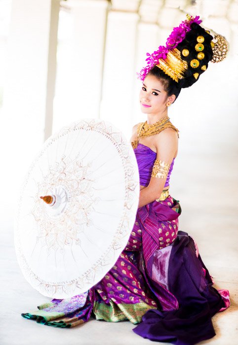 A high key portrait of the Thai girl in traditional clothes 