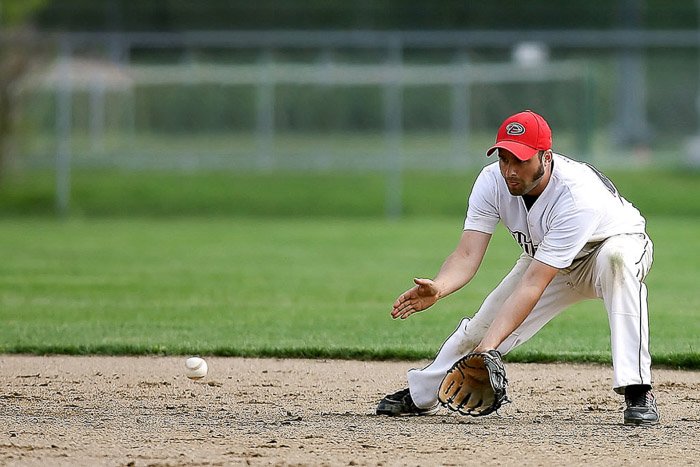 Фотография бейсбольного игрока во время игры