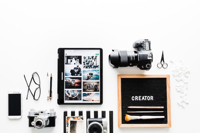 a flatlay of photography business equipment - photography marketing mistakes
