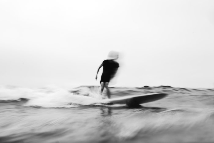 Motion blur photo of the man surfing