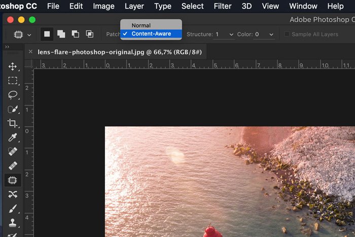Скриншот редактирования бликов объектива на фотографии в Adobe Photoshop