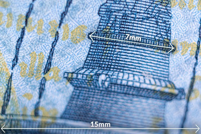 Макроснимок крошечного участка венгерской банкноты номиналом 1000 форинтов