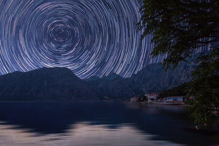 A stunning milky way time lapse above mountains and valley