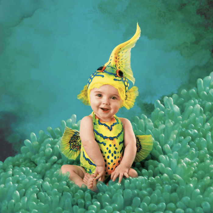 Baby dressed as fish from best baby photographer anna geddes