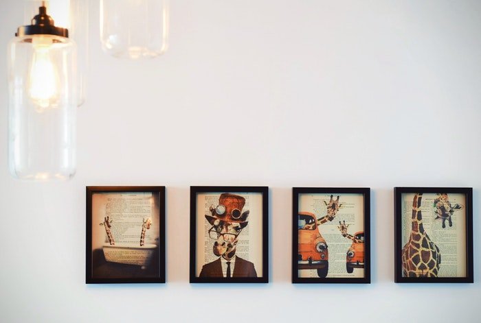 Framed prints on a wall