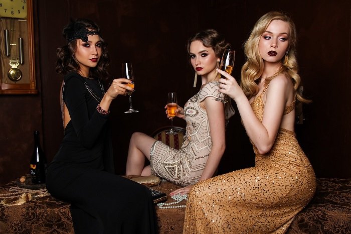 stock photo of three woman dressed in elegant clothes