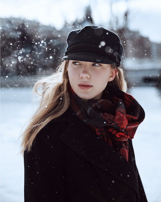 stock photo portrait of woman with snow falling